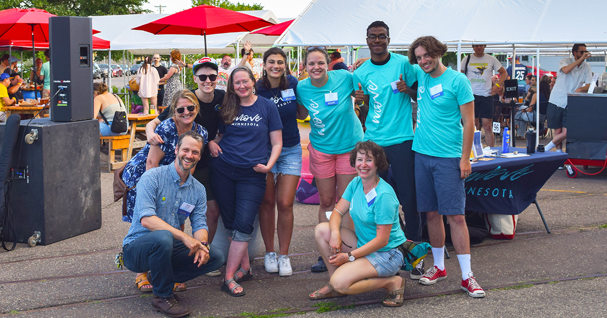 Move Minnesota staff at outdoor Rock Your Ride event in Saint Paul.