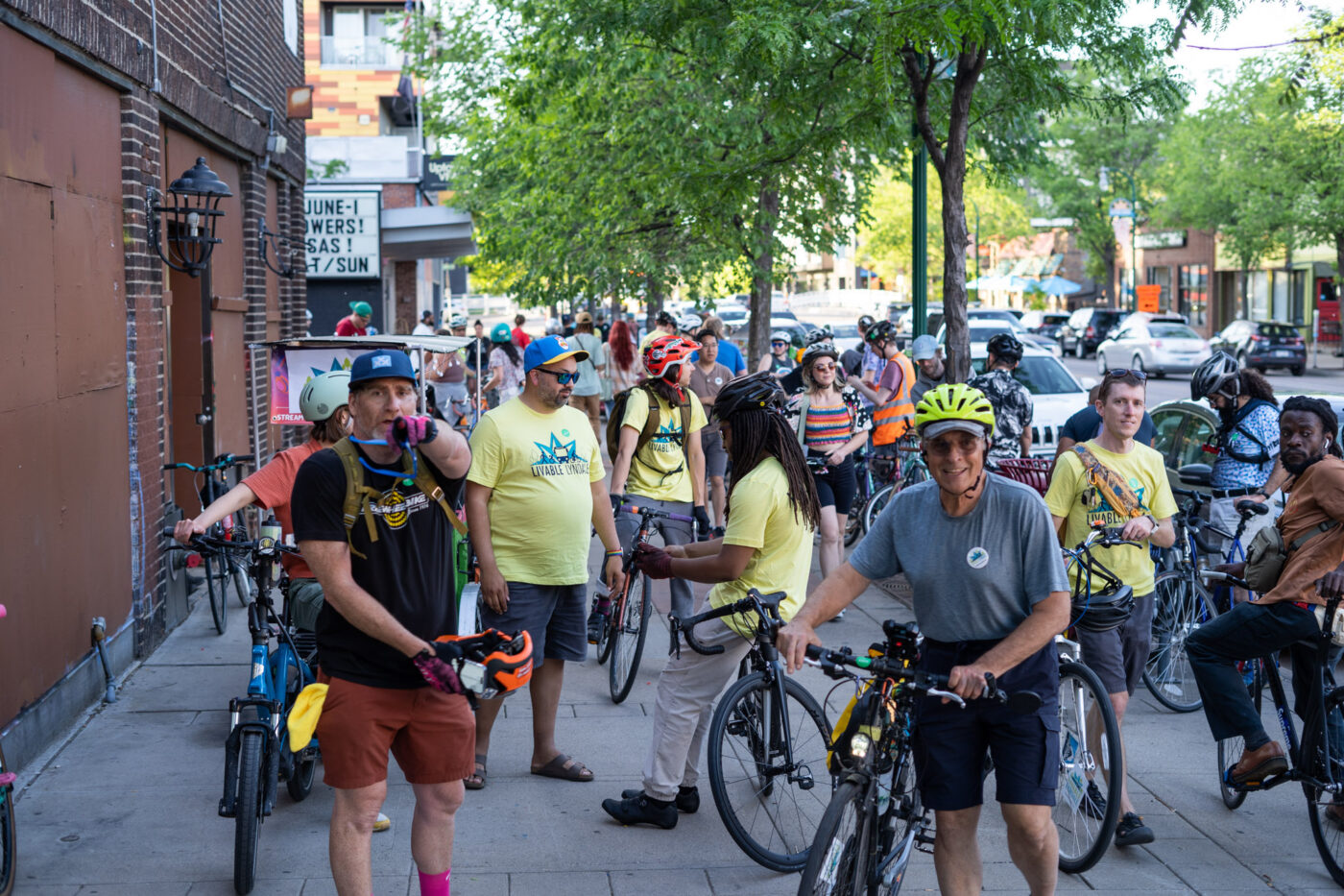 A group of volunteers getting ready on the sidewalk on Lyndale Avenue