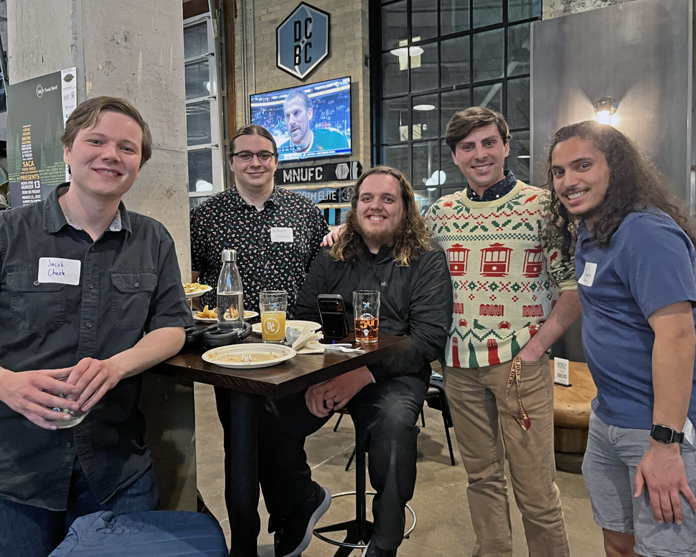 A group of friends and transit advocates at the social 